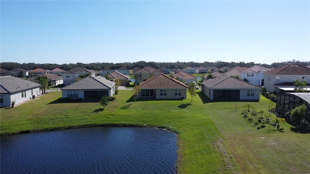 drone / aerial view with a water view