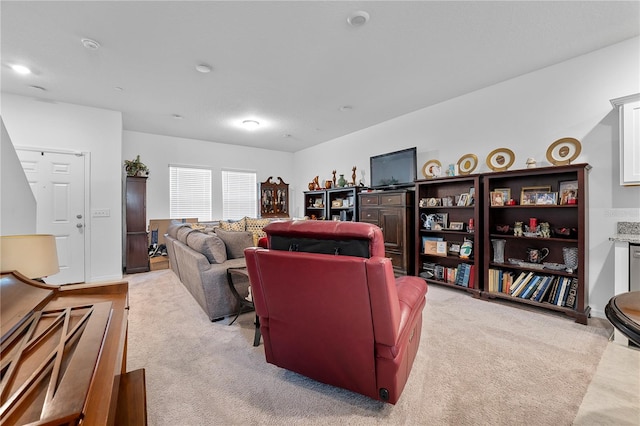 living room with light colored carpet