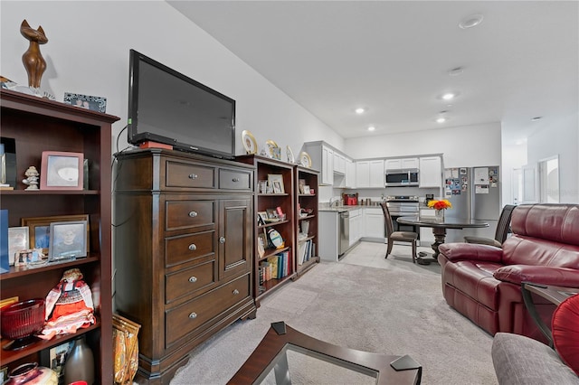 living room with light colored carpet