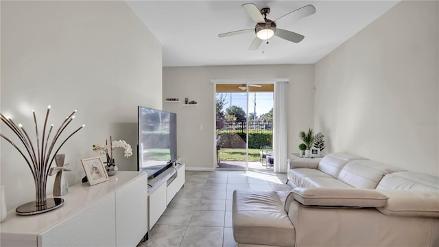 living room with light tile patterned flooring and ceiling fan