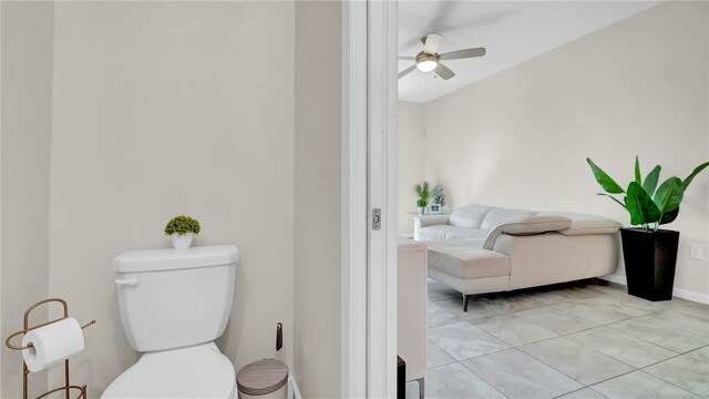 bathroom with tile patterned floors, toilet, and ceiling fan