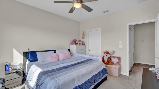 carpeted bedroom with ceiling fan