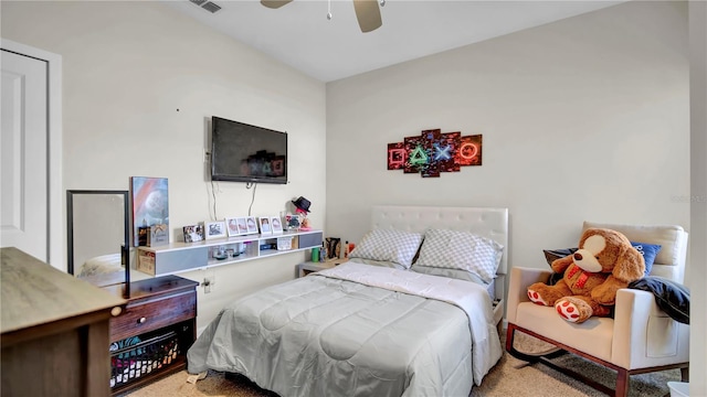 carpeted bedroom with ceiling fan