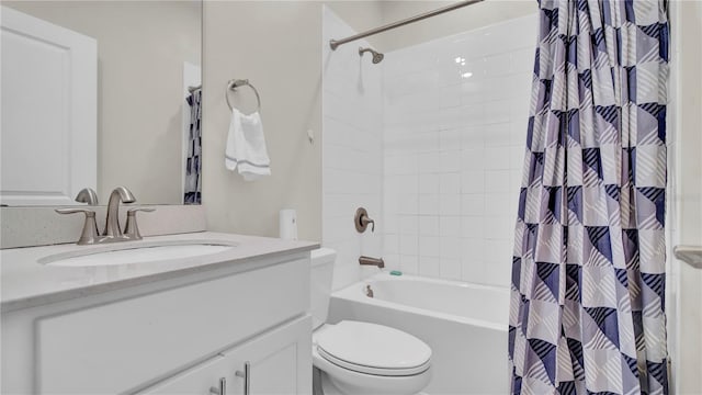 full bathroom with vanity, toilet, and shower / tub combo