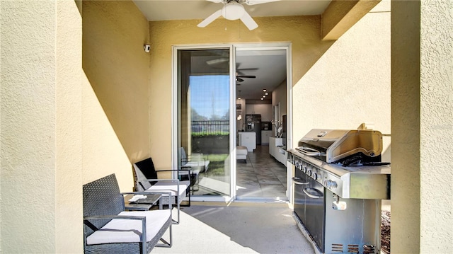 view of patio featuring ceiling fan and a grill