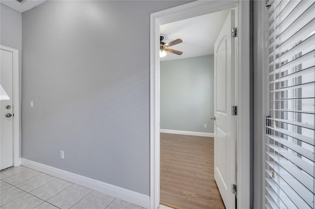 entryway with light hardwood / wood-style flooring and ceiling fan