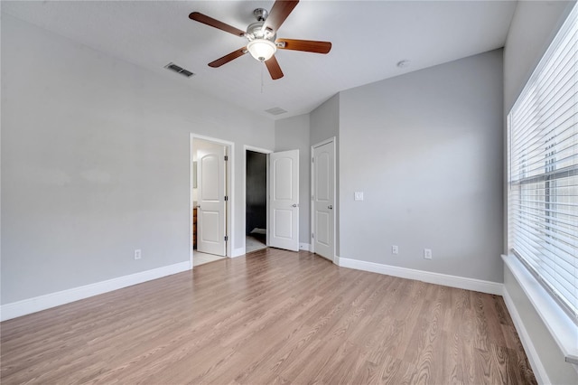 unfurnished bedroom with light hardwood / wood-style floors and ceiling fan