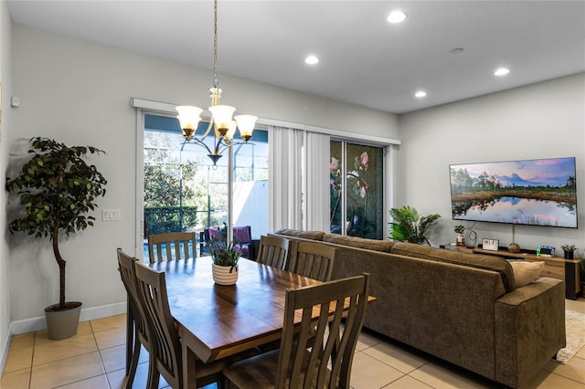 dining area with light tile patterned floors, baseboards, a chandelier, and recessed lighting