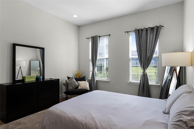 bedroom with recessed lighting and carpet flooring