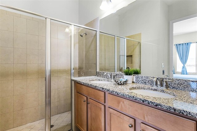 434 Captiva Dr, Davenport, FL 33896 - full bath featuring a sink, double vanity, and a stall shower