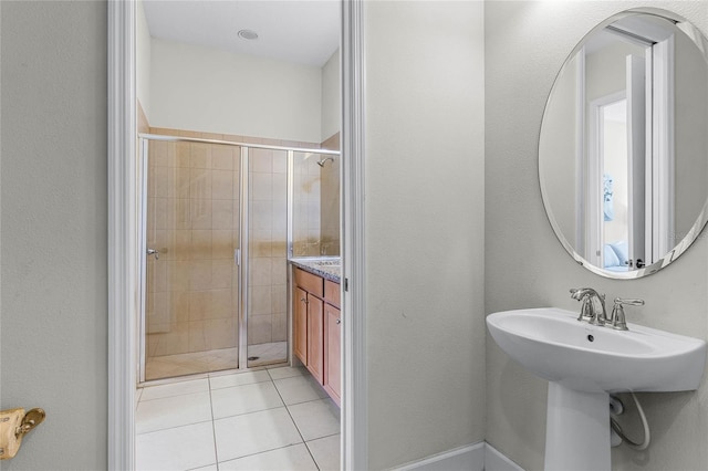 full bath with tile patterned flooring and a stall shower