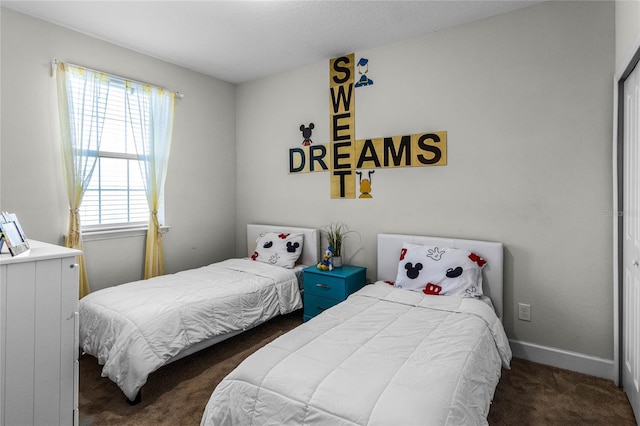 434 Captiva Dr, Davenport, FL 33896 - bedroom with carpet flooring and baseboards