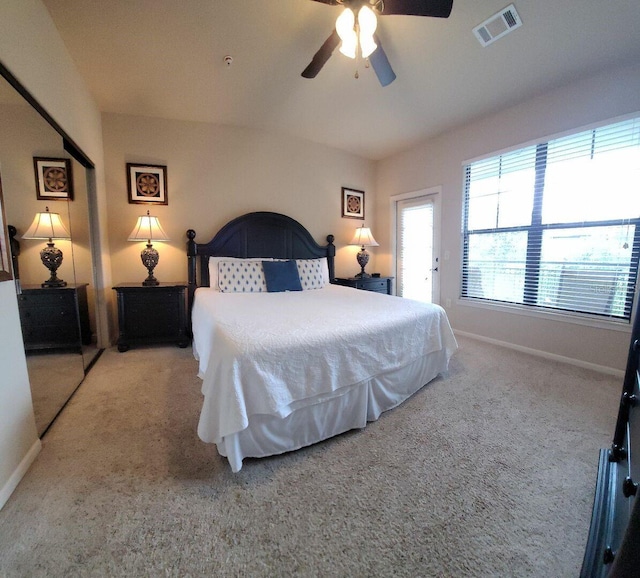 carpeted bedroom with ceiling fan