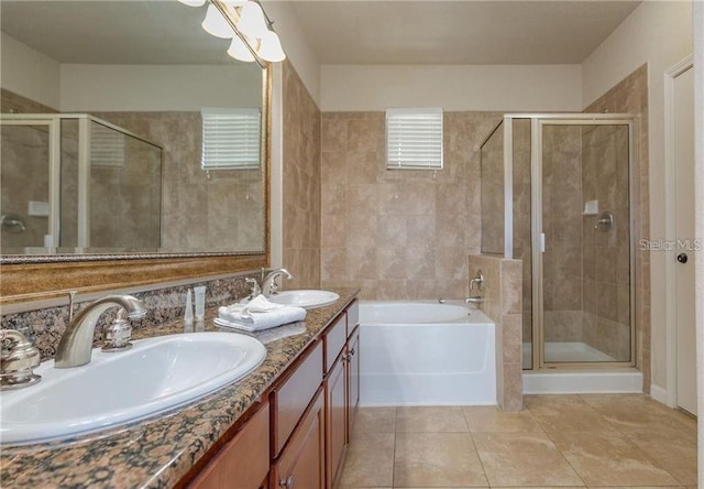 bathroom with vanity, separate shower and tub, and tile patterned flooring