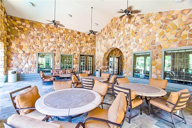 view of patio featuring ceiling fan