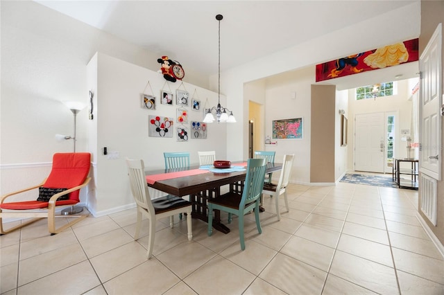 dining area featuring light tile patterned flooring