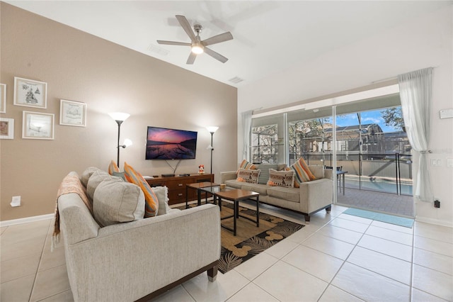 living room featuring light tile patterned flooring and ceiling fan