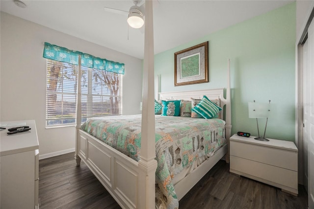 bedroom featuring dark hardwood / wood-style floors and ceiling fan