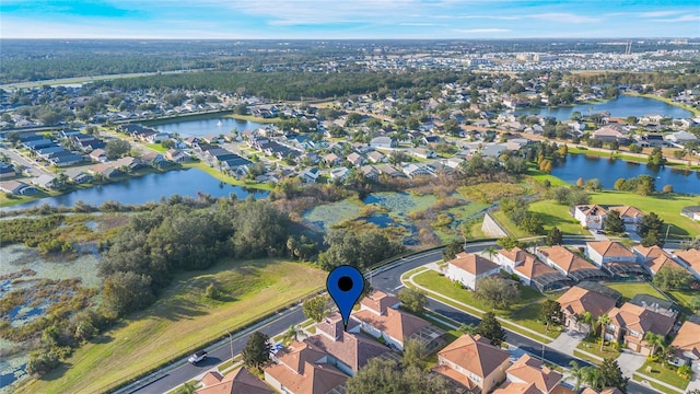 drone / aerial view with a water view