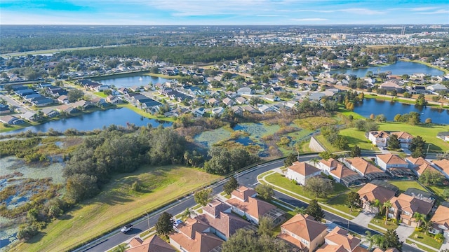 bird's eye view with a water view