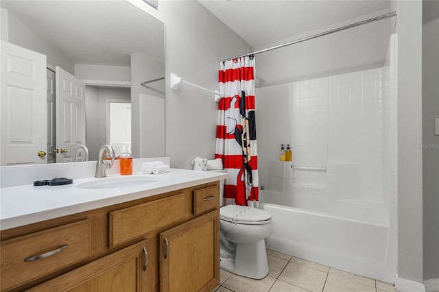 full bathroom with a textured ceiling, shower / bath combination with curtain, toilet, vanity, and tile patterned flooring