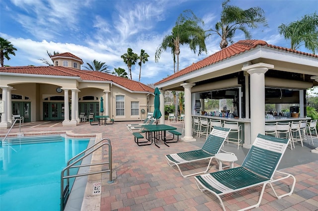 view of pool featuring a patio area