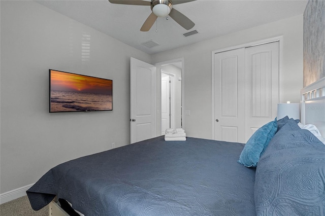 bedroom featuring carpet, a closet, and ceiling fan