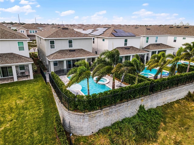 view of swimming pool with a patio area and a lawn