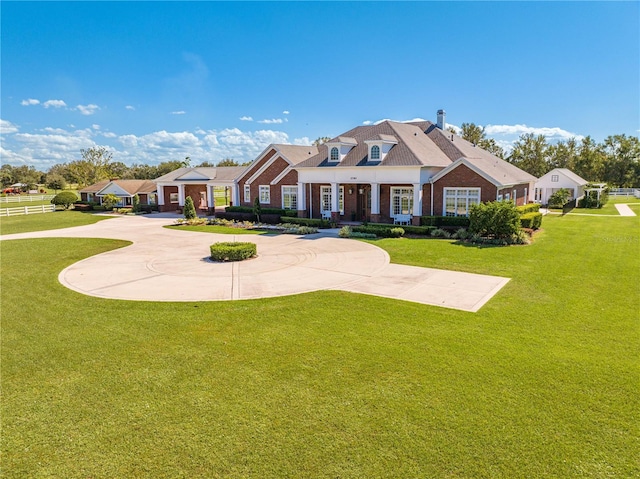 view of front of house with a front lawn