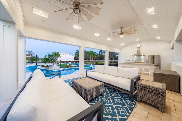 living room featuring wood ceiling, vaulted ceiling, and ceiling fan