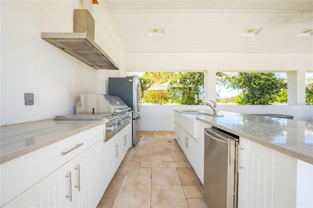 view of patio featuring sink and an outdoor kitchen