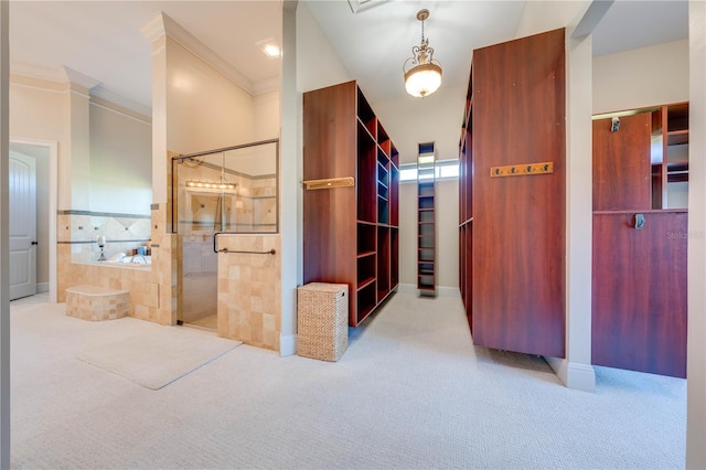 corridor with light colored carpet and crown molding