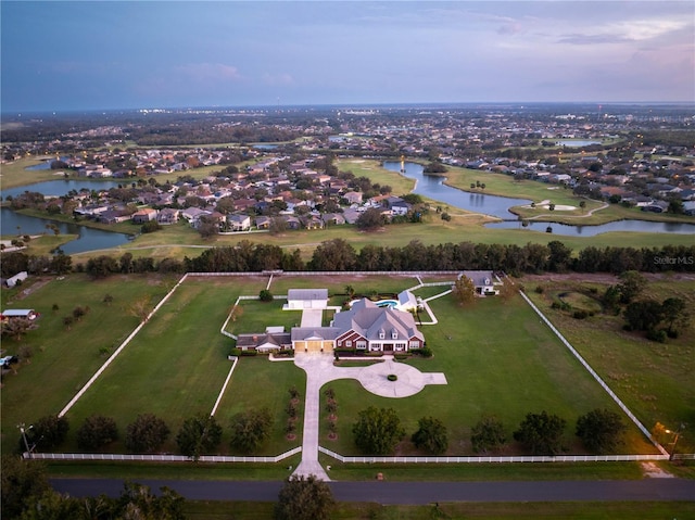 drone / aerial view featuring a water view