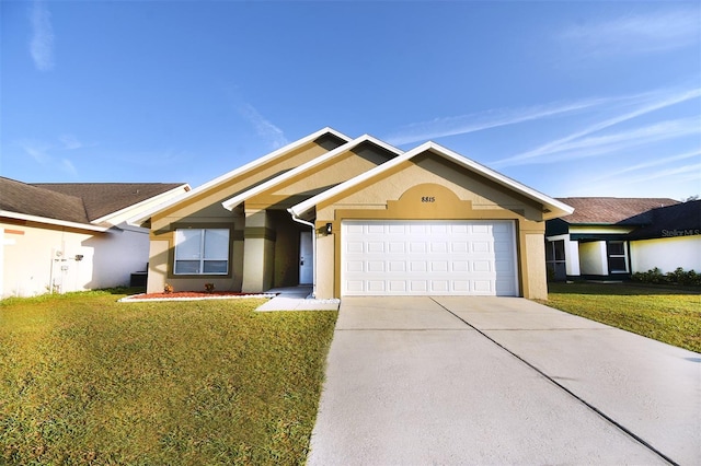 ranch-style house with a garage and a front lawn