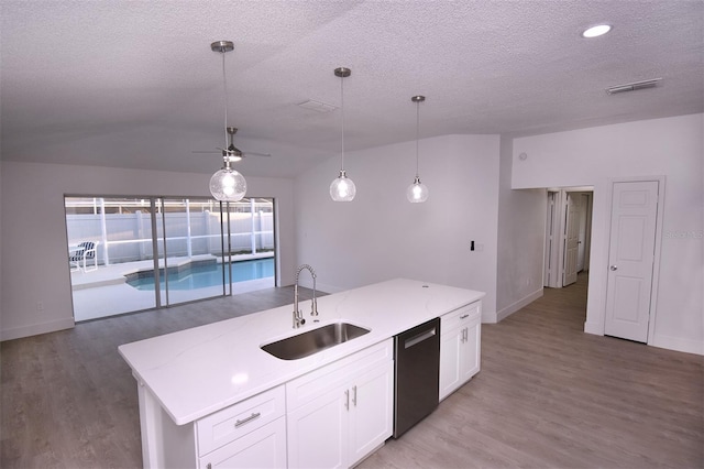 kitchen with sink, a center island, white cabinetry, pendant lighting, and stainless steel dishwasher