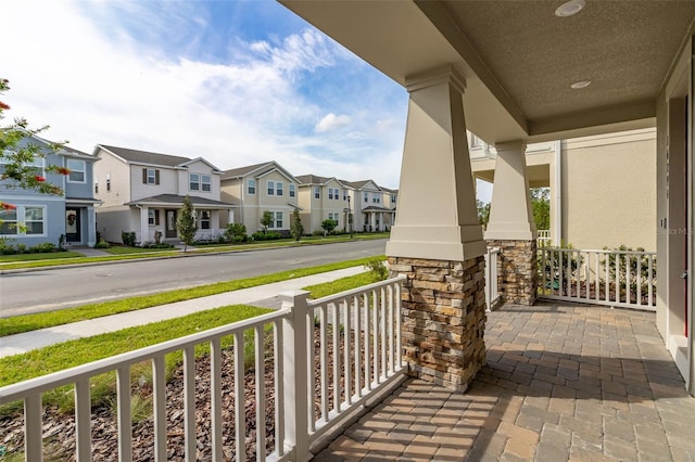 balcony featuring covered porch