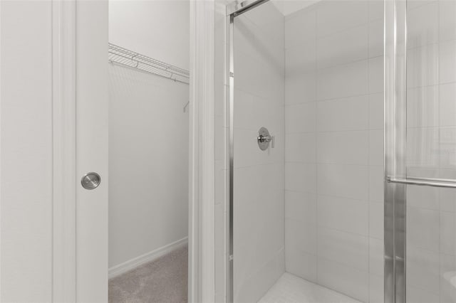 bathroom featuring walk in shower