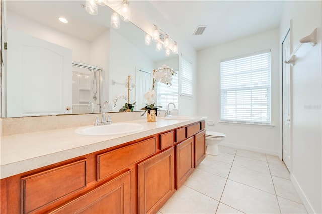 bathroom with tile patterned floors, lofted ceiling, toilet, vanity, and a shower with shower door