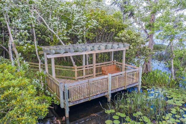 wooden deck with a water view