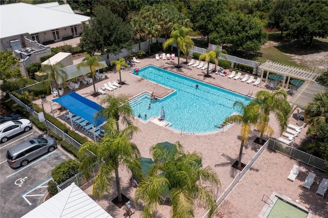 view of swimming pool with a patio