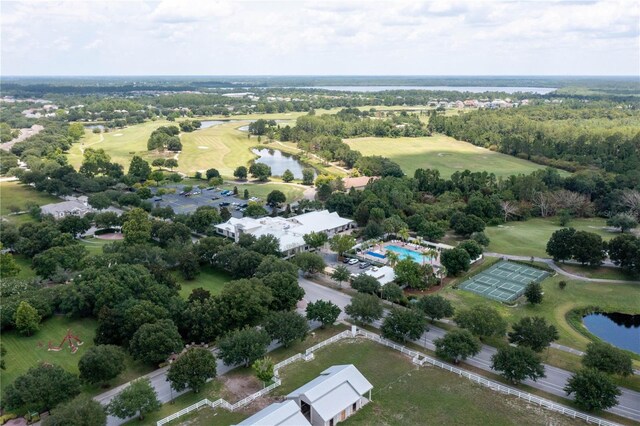 aerial view with a water view and golf course view