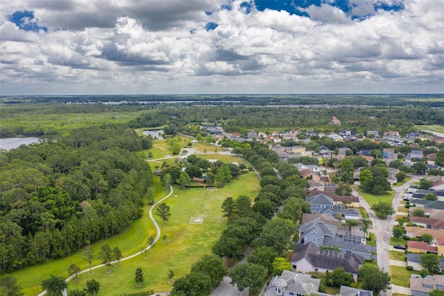 drone / aerial view with a water view and a residential view