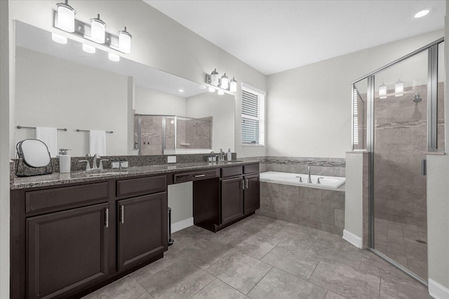 bathroom with vanity, shower with separate bathtub, and tile patterned floors