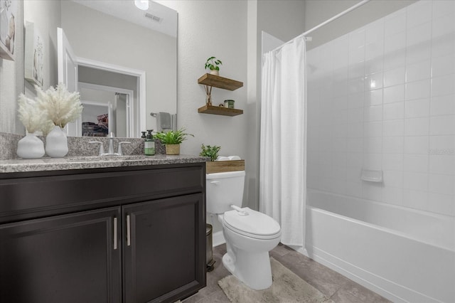 full bathroom with vanity, toilet, shower / bath combo with shower curtain, and tile patterned flooring