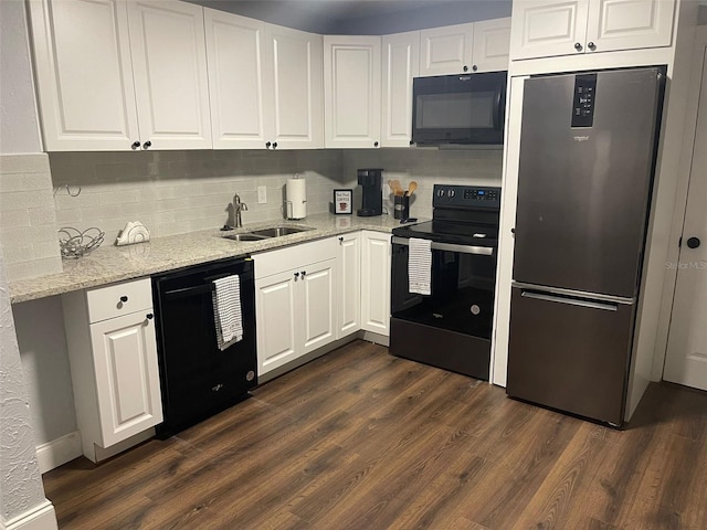 kitchen with backsplash, sink, black appliances, white cabinets, and dark hardwood / wood-style flooring