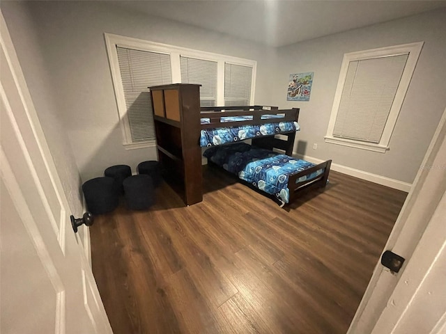 bedroom featuring dark hardwood / wood-style floors