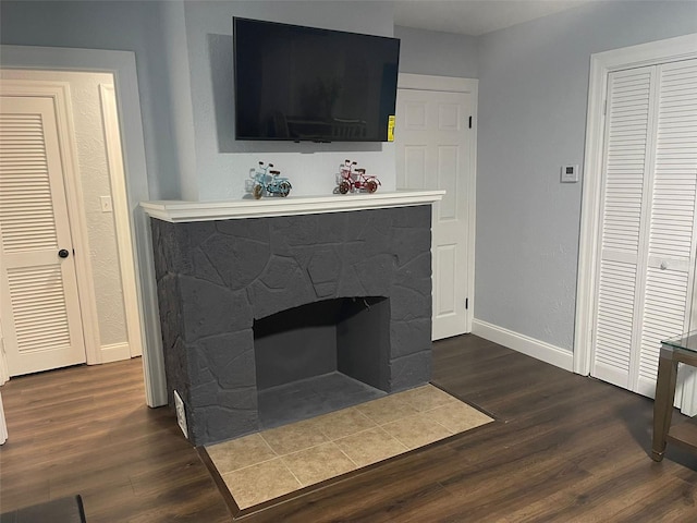 interior details with a fireplace and hardwood / wood-style floors