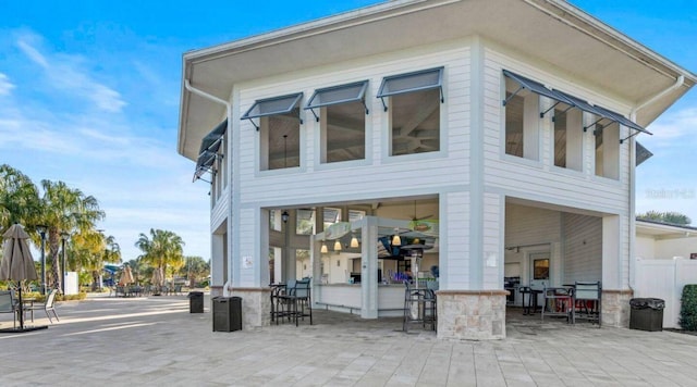 rear view of house featuring a patio area