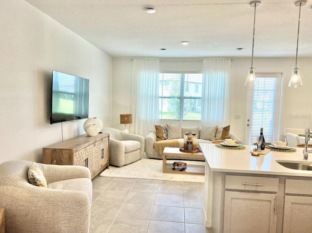 living area with light tile patterned floors