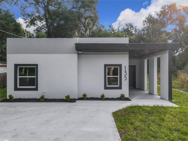 modern home featuring a carport